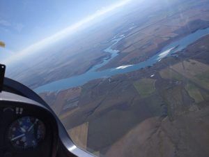 Photo from front seat of club glider in the air